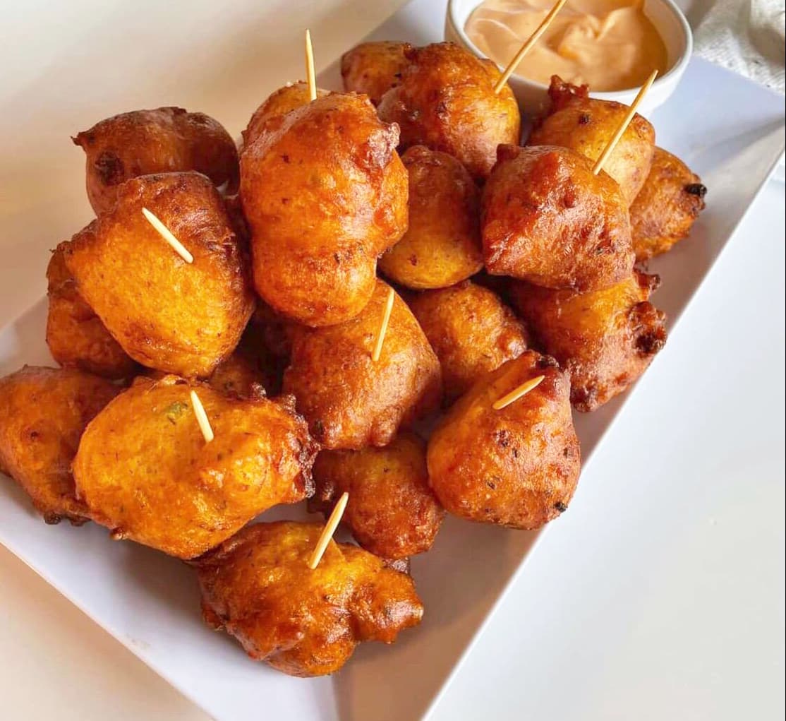 Happy-hour conch fritters served at the Inn